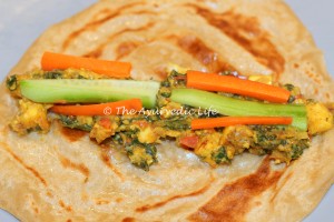 Paneer-Kale Frankie - Carrot and Cucumber sticks
