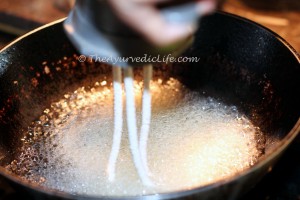 Thenkuzhal - Pouring in Oil